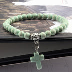 Pulsera de Perlas con Cruz