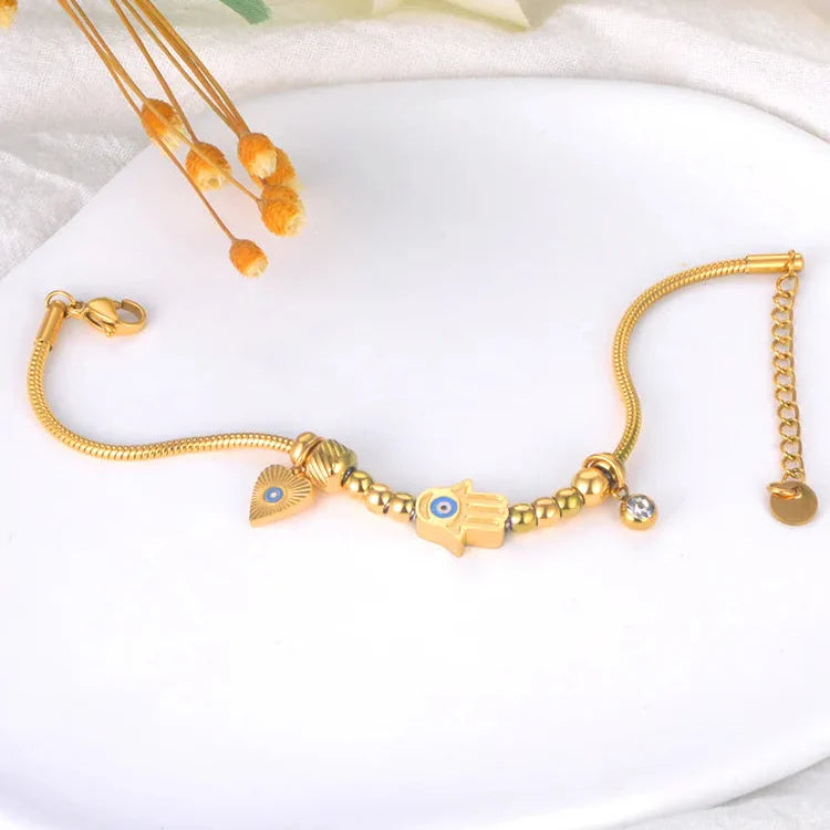 Pulsera de Protección con Mano de Fátima y Ojo Azul oro