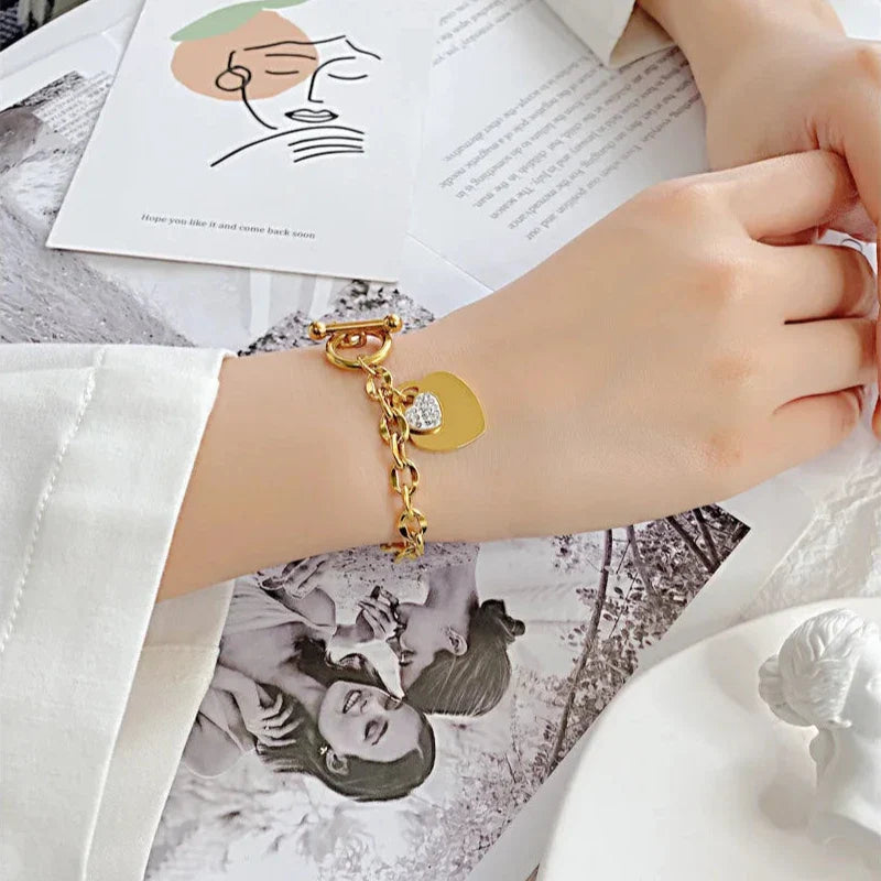 Pulsera Doble Corazón Esclava Mujer oro