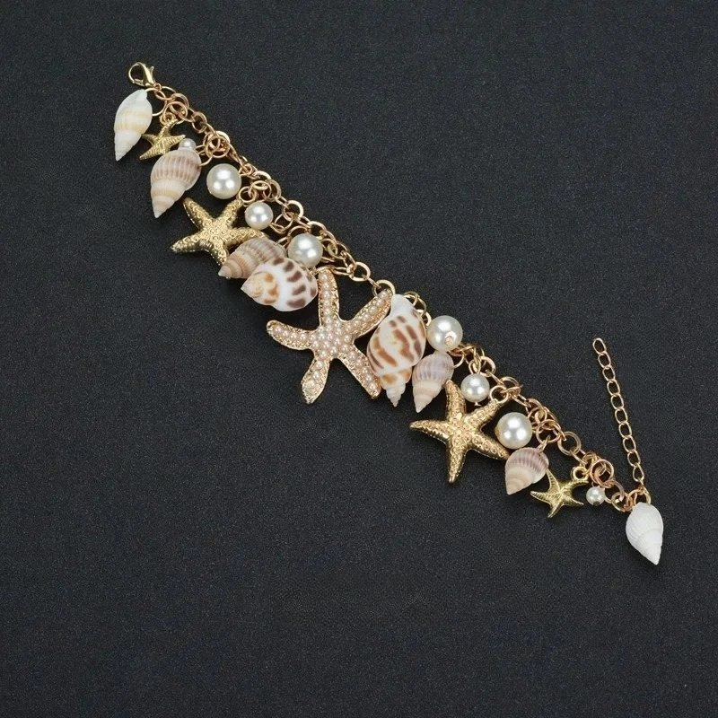 Pulsera Elegante con Conchas dorada