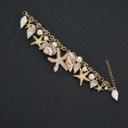 Pulsera Elegante con Conchas dorada