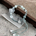 Pulsera de Cuerda con Perlas y Flor de Loto