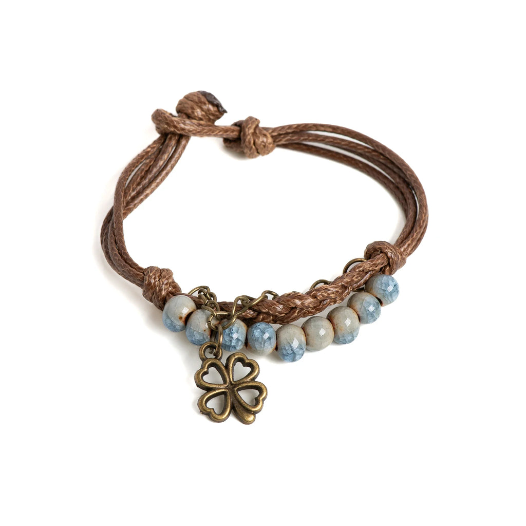 Pulsera de Cuerda con Trébol de 4 Hojas y Perlas azules