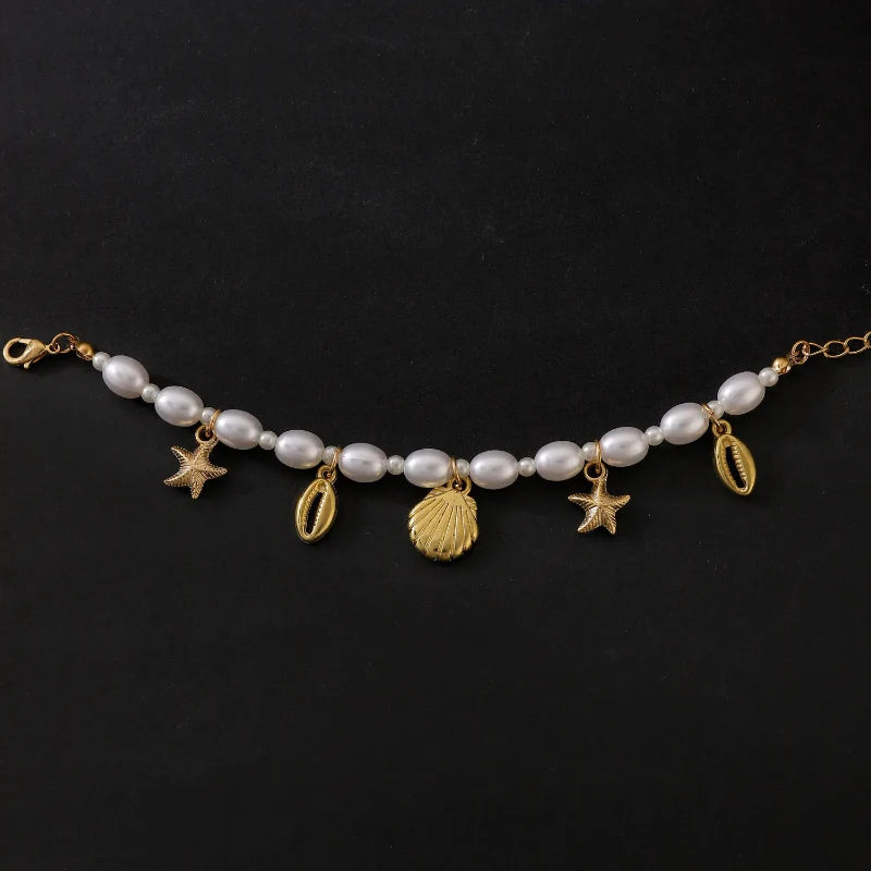 Pulsera de Perlas con Conchas