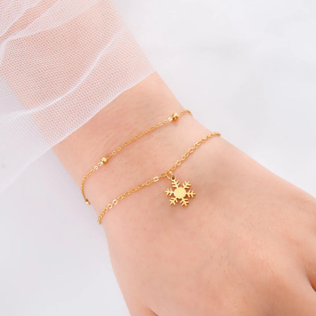 Pulsera Copo de Nieve Cadena Invierno oro