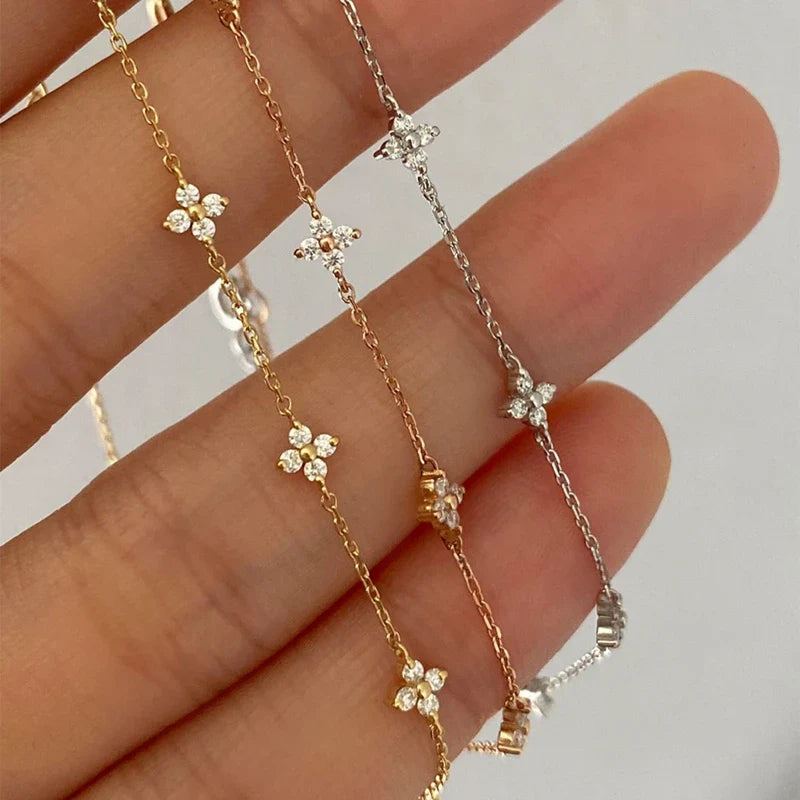 Pulsera Gourmette con Finas Flores en Zirconio plata