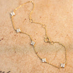 Pulsera Gourmette con Finas Flores en Zirconio oro