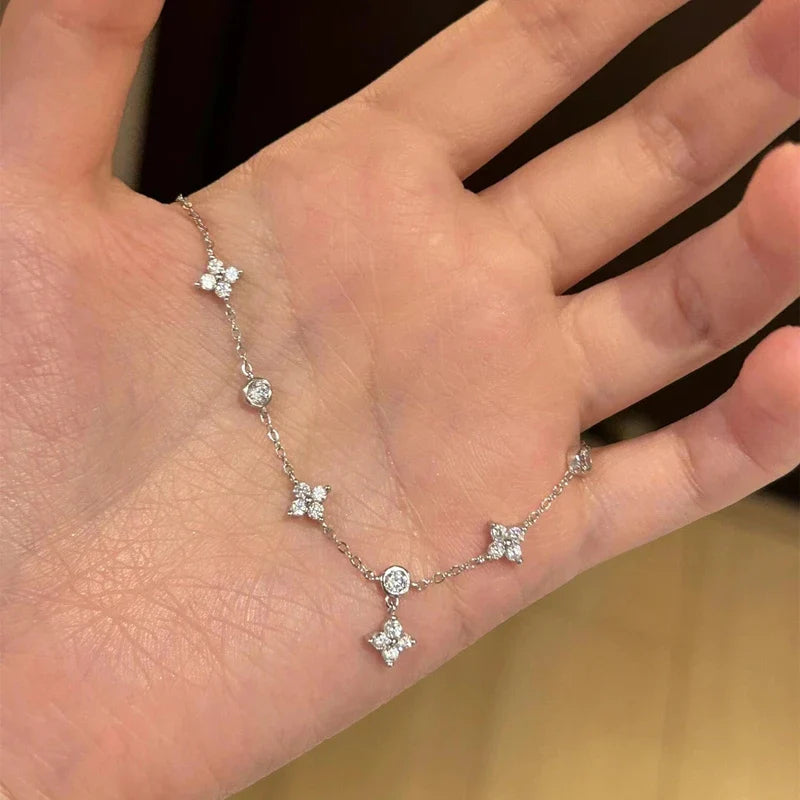 Pulsera Gourmette con Finas Flores en Zirconio plata
