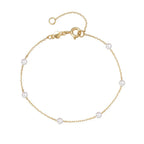 Pulsera fina cadena con perlas blancas