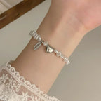 Pulsera Gourmette para Mujer con Perlas y Corazón