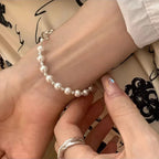 Pulsera de eslabones con hermosas perlas blancas