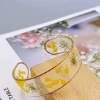 Pulsera Gourmette Flor en Resina Transparente amarillo a