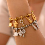 Bracelet pour femme avec clefs et cadenas