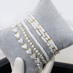 Pulseras de Perlas y Corazones