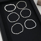 Pulseras de Perlas y Corazones