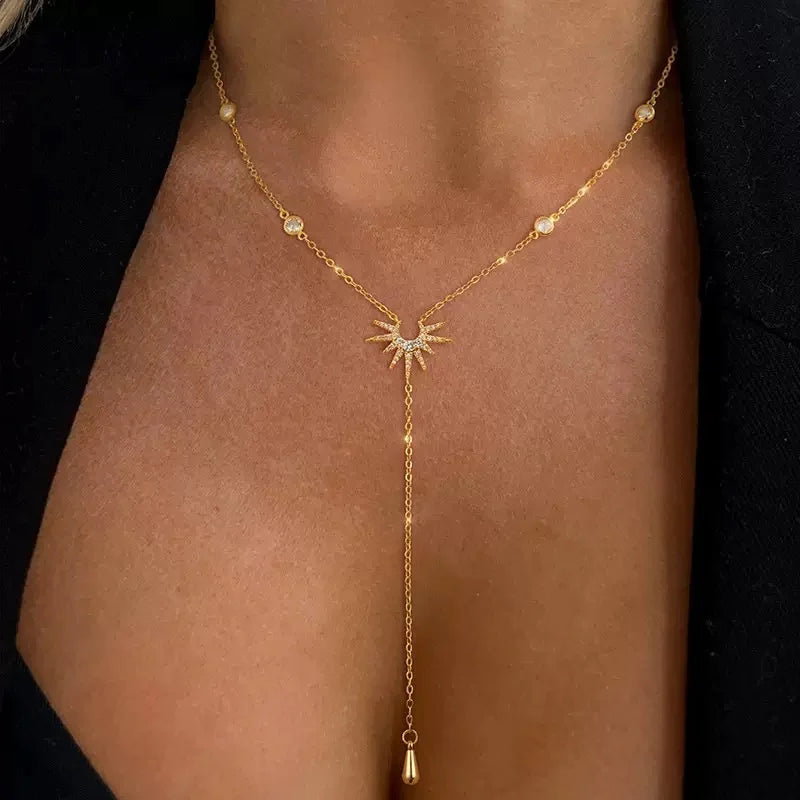 Collar con largo colgante Sol dorado