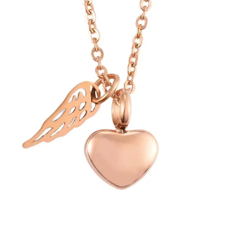 Collier avec pendentif ailes d'ange et son urne à cendres