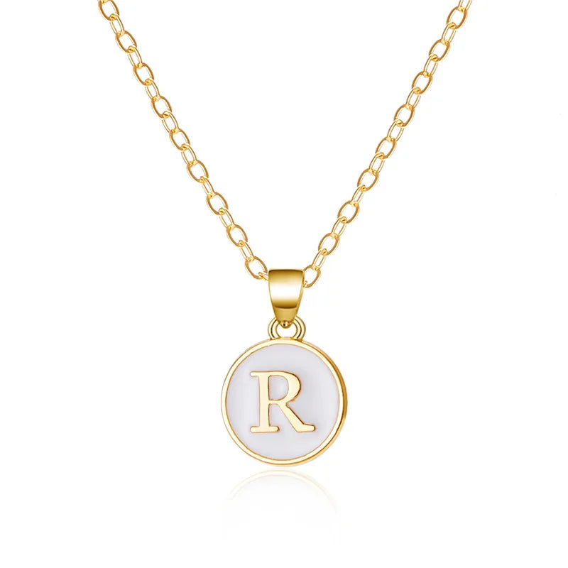 Collier avec pendentif blanc initiale - lettre