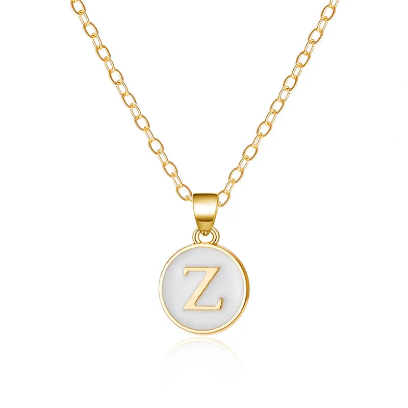 Collier avec pendentif blanc initiale - lettre