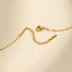 Collar con Colgante de Flor en Circonita Giratoria Antiestrés