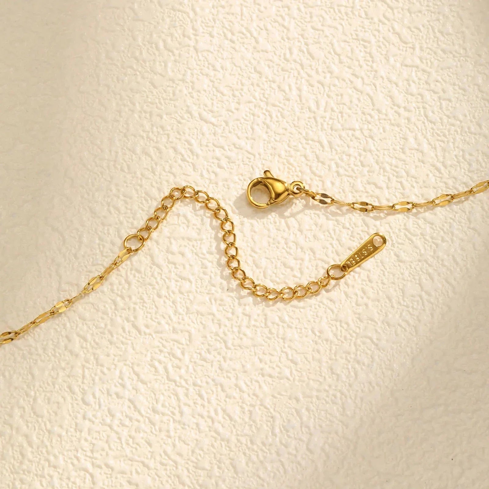 Collar con Colgante de Flor en Circonita Giratoria Antiestrés