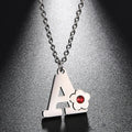 Collier avec pendentif fleur et initiale - lettre