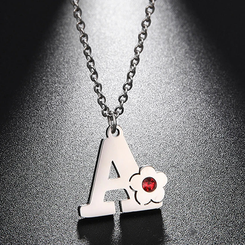 Collier avec pendentif fleur et initiale - lettre