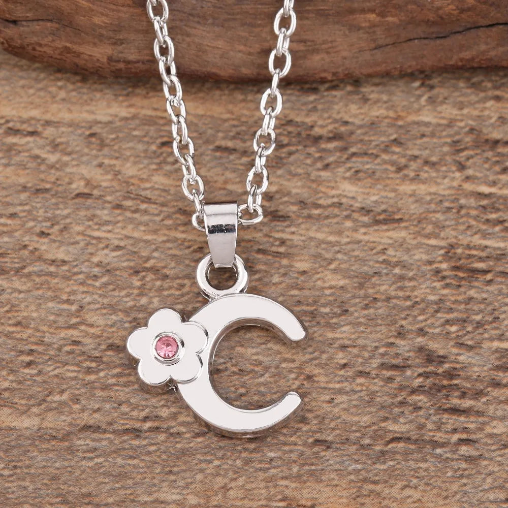 Collier avec pendentif fleur et initiale - lettre