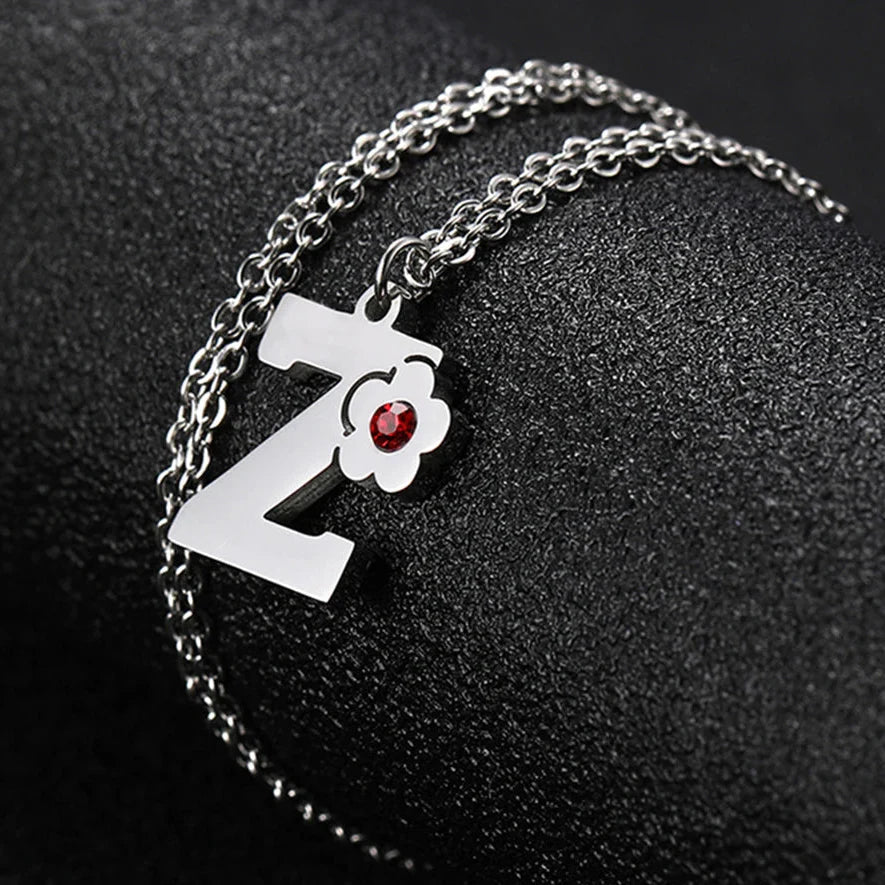Collier avec pendentif fleur et initiale - lettre