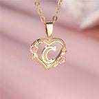 Collier avec pendentif initiale coeur et fleurs - lettre