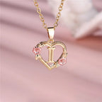 Collier avec pendentif initiale coeur et fleurs - lettre