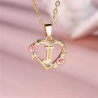 Collier avec pendentif initiale coeur et fleurs - lettre