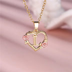 Collier avec pendentif initiale coeur et fleurs - lettre