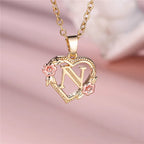Collier avec pendentif initiale coeur et fleurs - lettre
