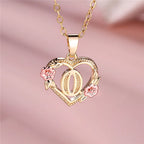 Collier avec pendentif initiale coeur et fleurs - lettre