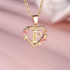 Collier avec pendentif initiale coeur et fleurs - lettre