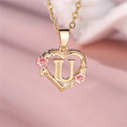 Collier avec pendentif initiale coeur et fleurs - lettre