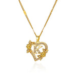 Collier avec pendentif initiale et coeur - lettre