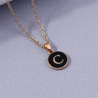 Collier avec pendentif noir initiale - lettre