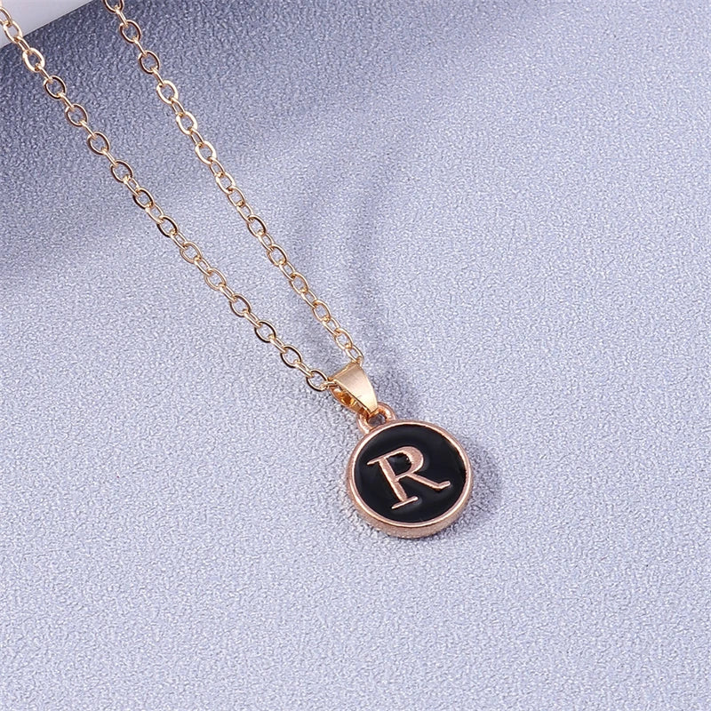 Collier avec pendentif noir initiale - lettre