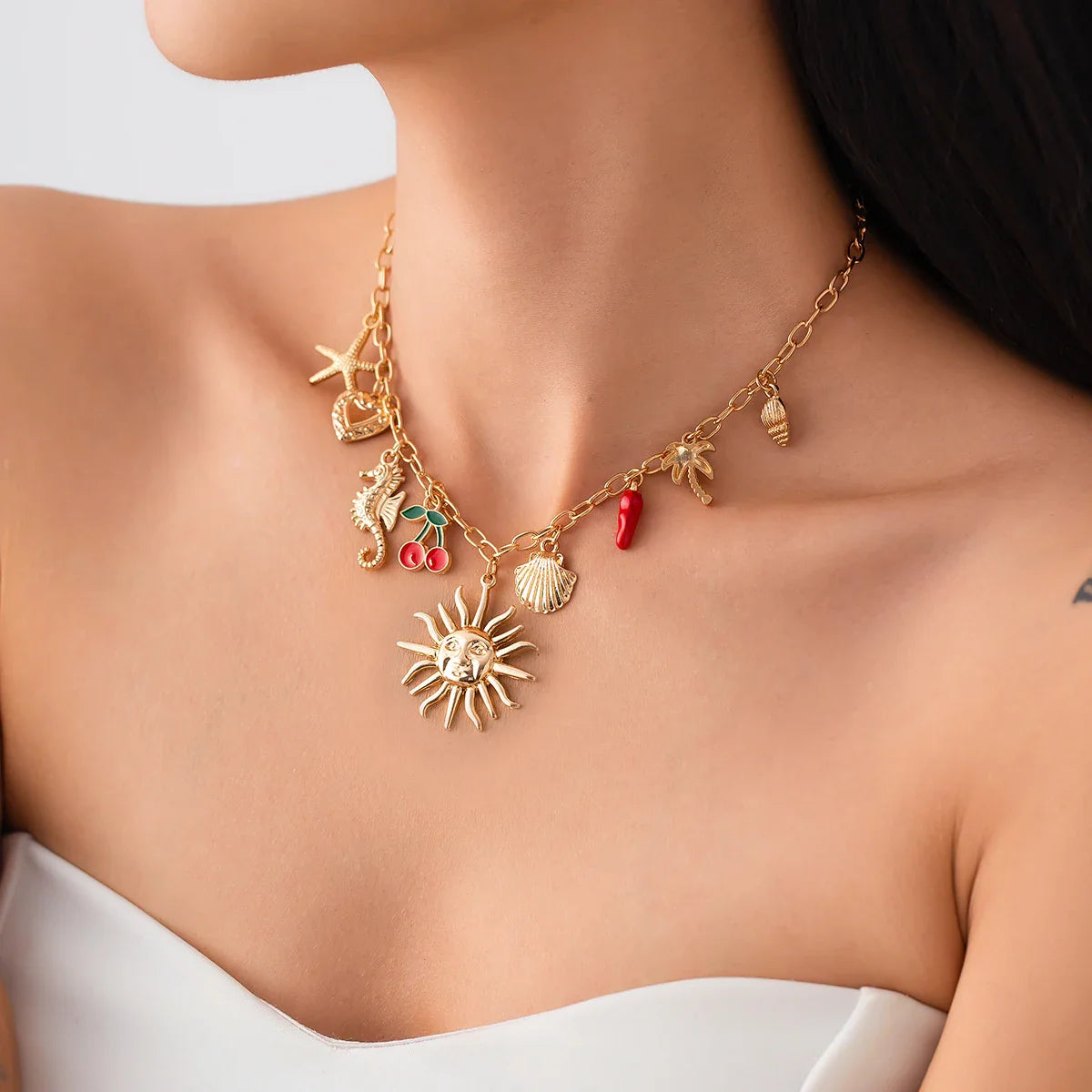 Collar con Colgante de Sol y Conchas 1