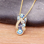 Collar con colgante de lengua ojo azul y circonio