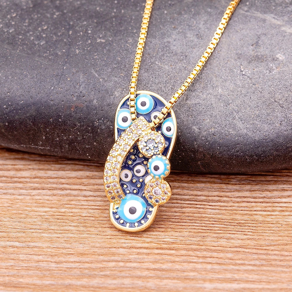 Collar con colgante de lengua ojo azul y circonio