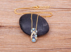 Collar con colgante de lengua ojo azul y circonio