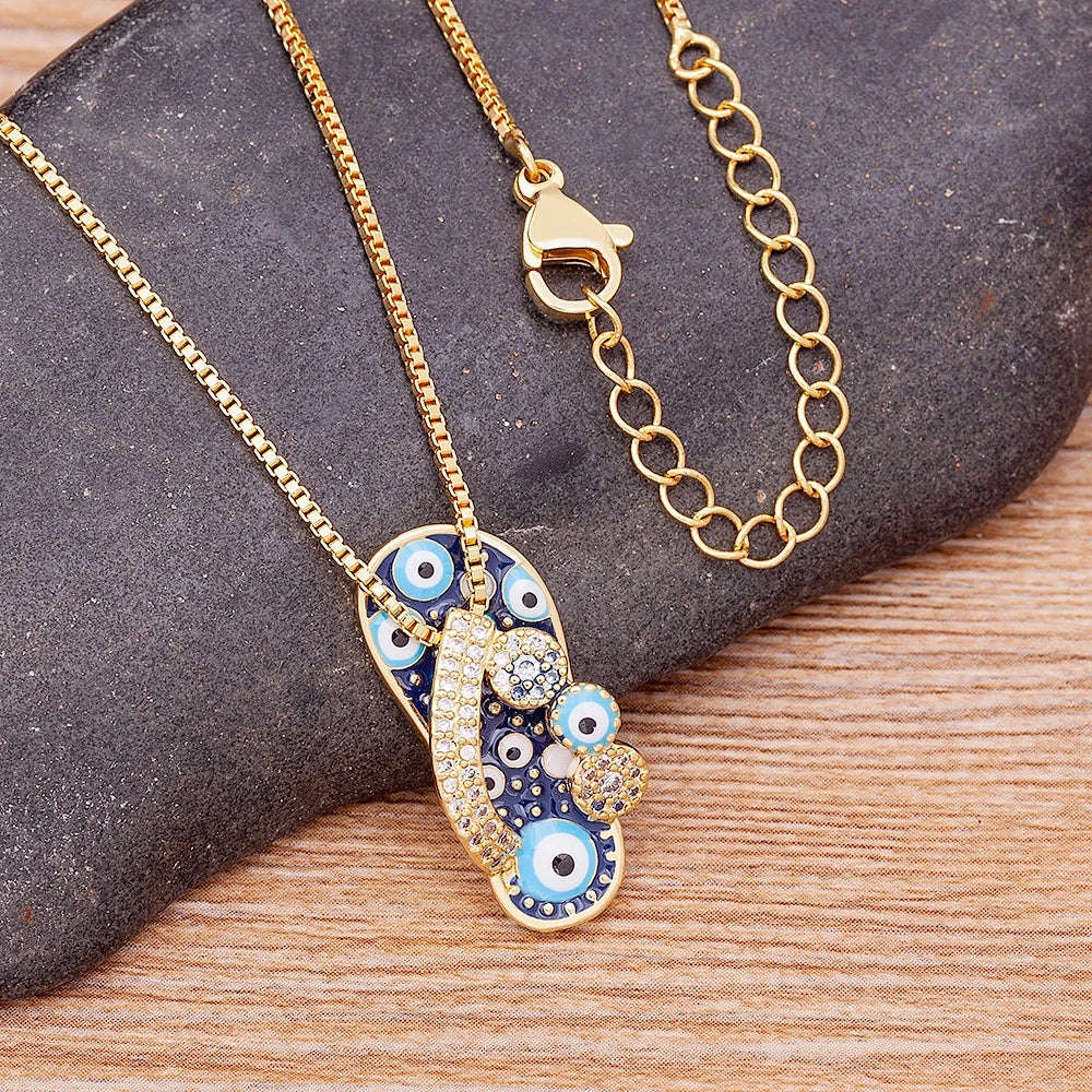 Collar con colgante de lengua ojo azul y circonio