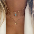 Collar Doble con Colgante Ojo Azul Turco y Mano de Fátima oro