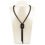 Collier long avec pendentif noeud