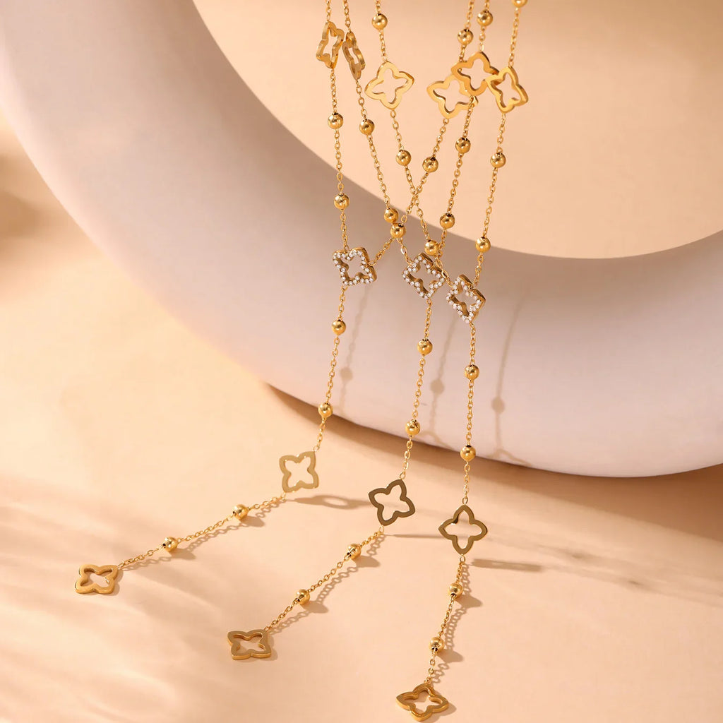 Collar Largo con Colgantes de Trébol de 4 Hojas y Circonio dorado