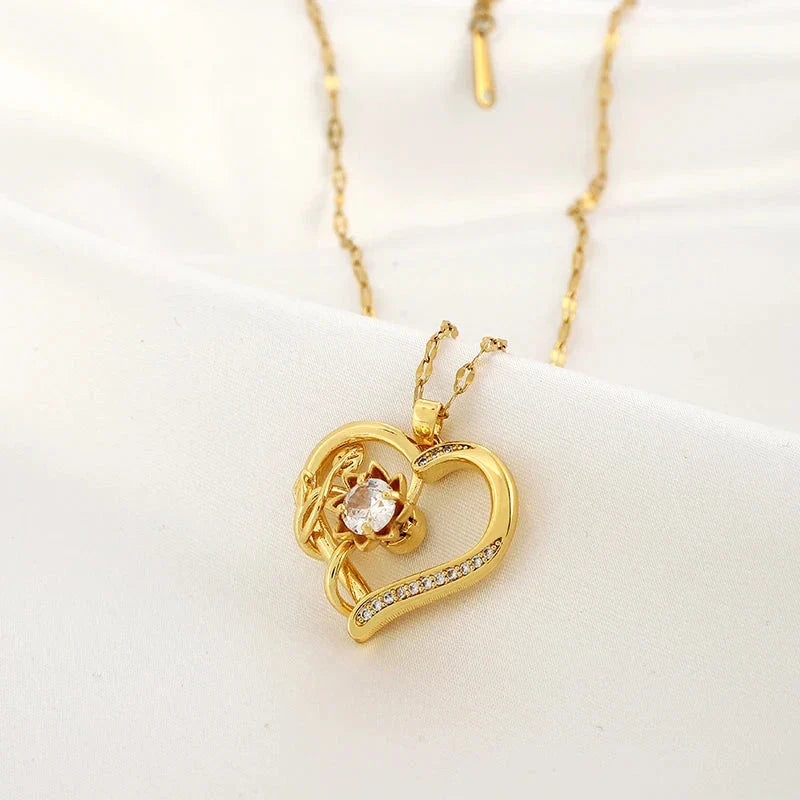 Collar Colgante con Corazón y Flor Giratoria Anti-Estrés