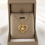 Collar Colgante con Corazón y Flor Giratoria Anti-Estrés